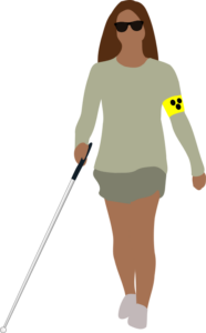 A young woman walks with her cane. On her arm she wears a yellow bracelet with a paw print on it.